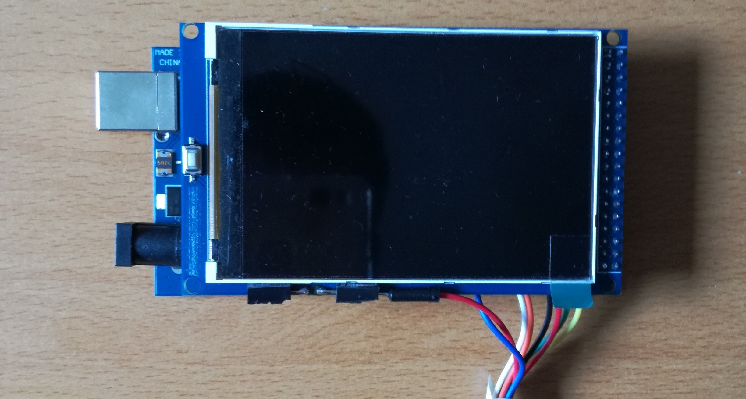 LCD module on top of the microcontroller board