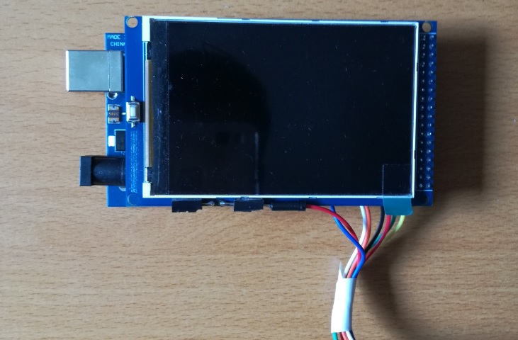 LCD screen placed on top of the Arduino Mega 2560 board connected to the Sensor module