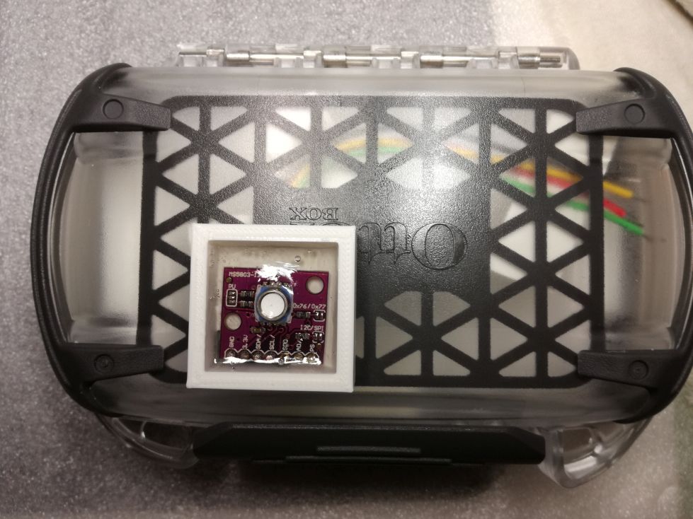 Apply two component clear epoxy glue onto the pressure sensor PCB