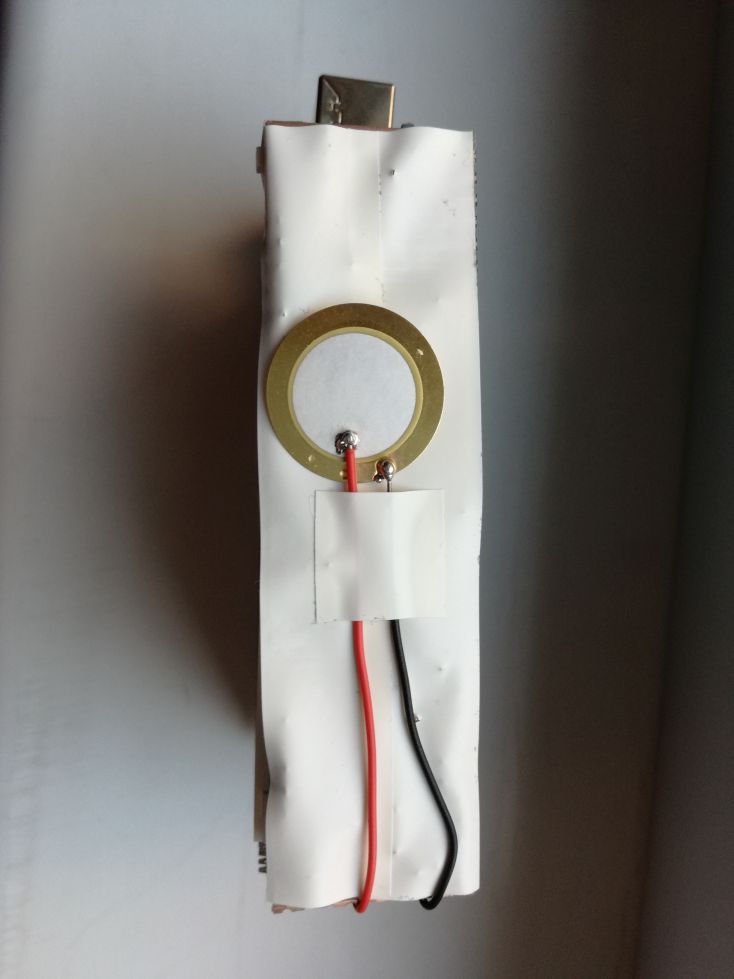The back side of Long Board was covered with white Electrical Insulation Adhesive Tape