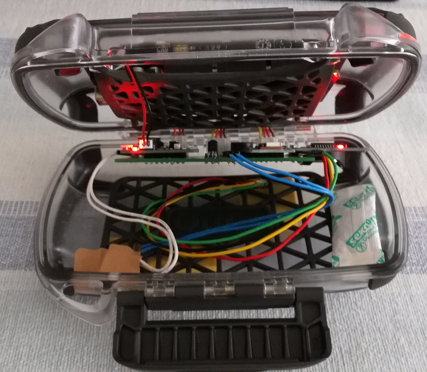 DiveIno PCB board placed into the Otterbox Pursuit 40 case